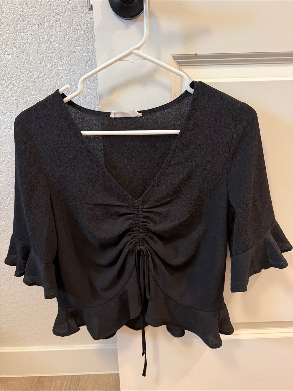 Elodie Black Ruched Tie-Front Ruffle V-Neck Top